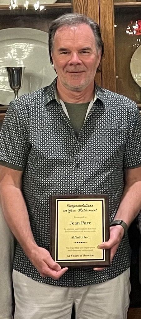Jean Pare Retires - Photo of Jean Pare and plaque